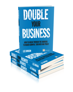 Double Your Business books in a pile