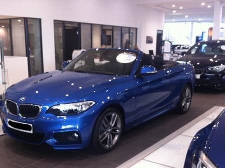 Julie bought her new BMW convertible in December, deciding she could afford it after all!